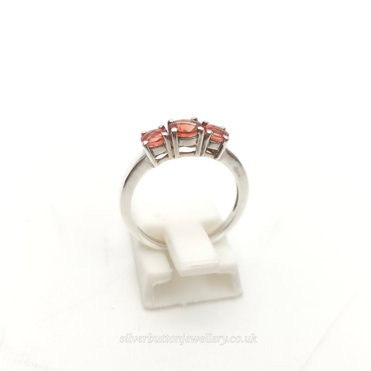 Sterling Silver Round Chequerboard Cut Orange Stone Trilogy Ring