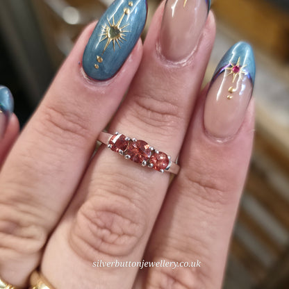 Sterling Silver Round Chequerboard Cut Orange Stone Trilogy Ring