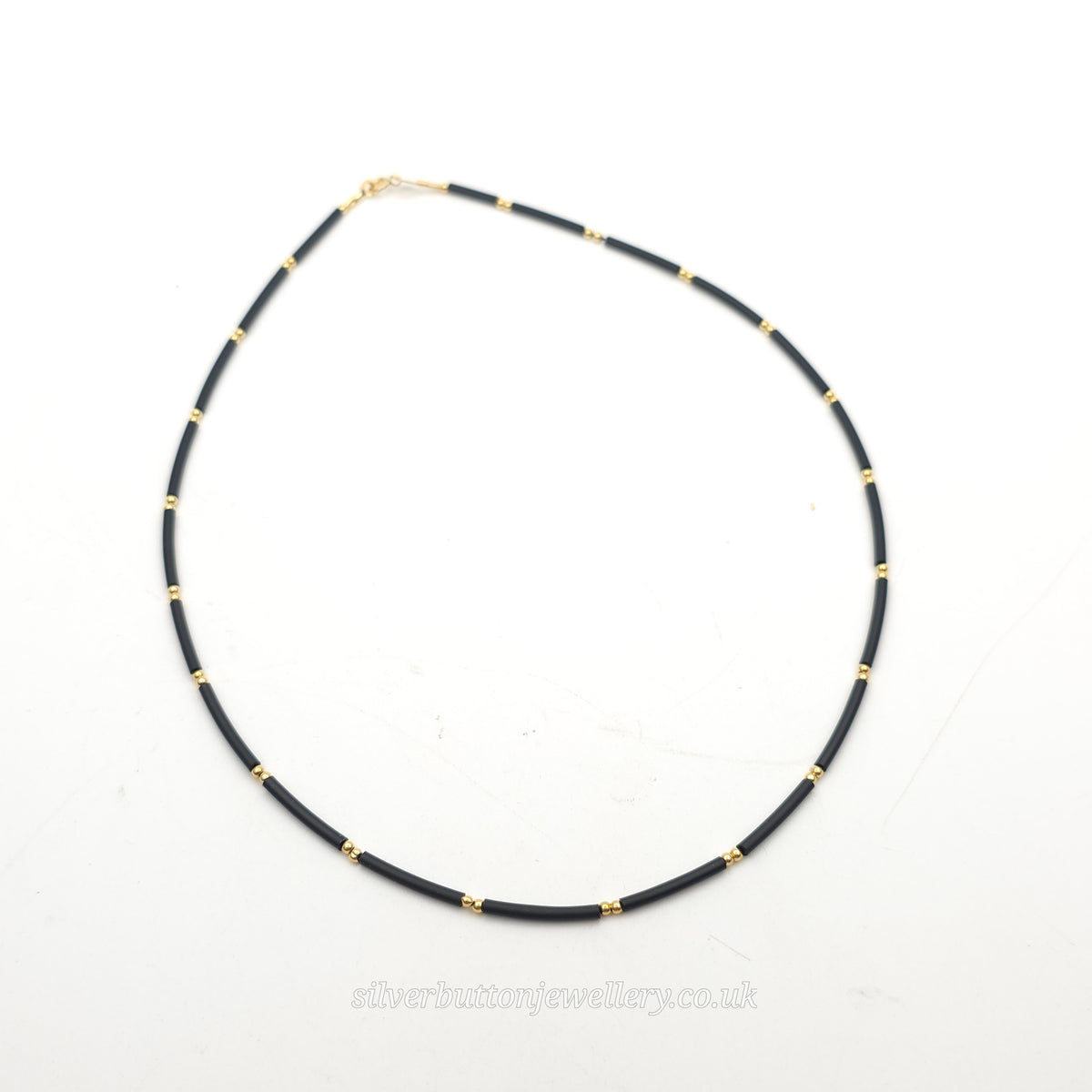 18ct Yellow Gold And Black Rubber Tube Spacer Corded Necklace With Gold Clasp