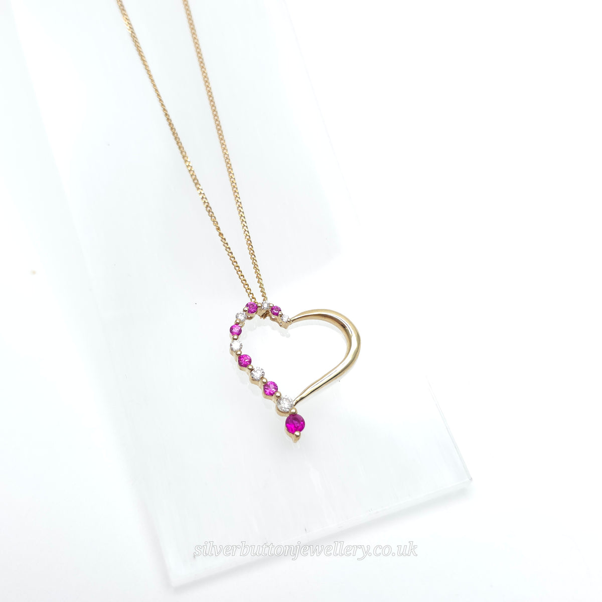 9ct Yellow Gold Openwork Heart Pendant With Diamonds & Pinky Red Stones Necklace