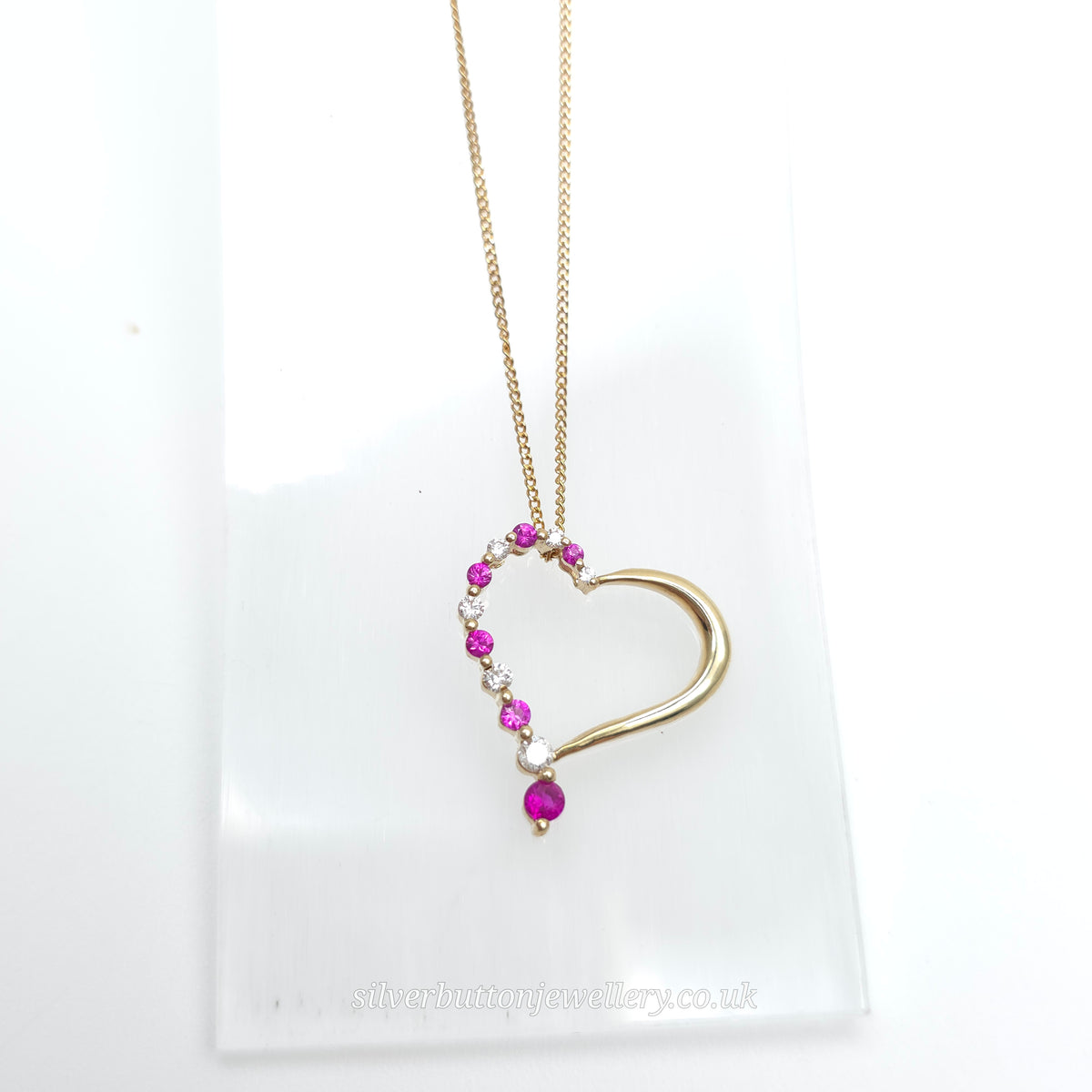 9ct Yellow Gold Openwork Heart Pendant With Diamonds & Pinky Red Stones Necklace