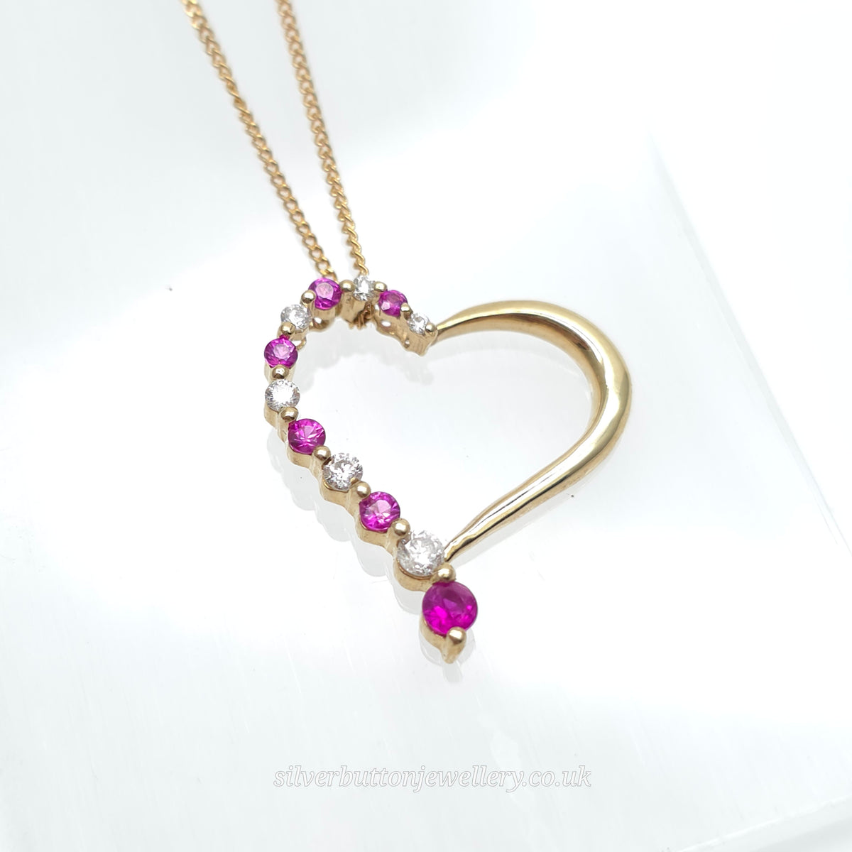 9ct Yellow Gold Openwork Heart Pendant With Diamonds & Pinky Red Stones Necklace