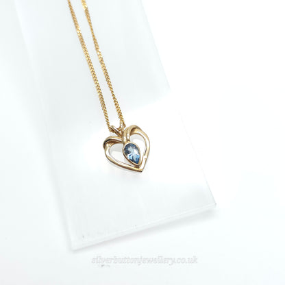 9ct Yellow Gold Pear Cut Blue Topaz Open Heart Pendant And Chain Necklace