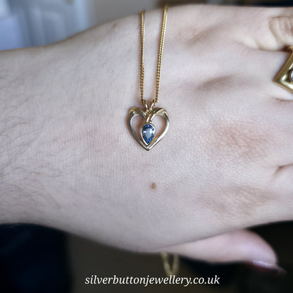 9ct Yellow Gold Pear Cut Blue Topaz Open Heart Pendant And Chain Necklace