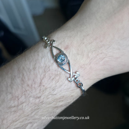 Sterling Silver Vintage Round Cut Blue Topaz Openwork Bangle