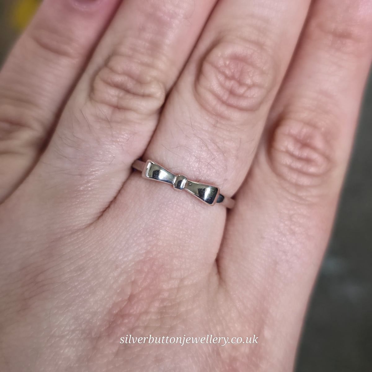 Sterling Silver Bow Profile Polished Finish Ring