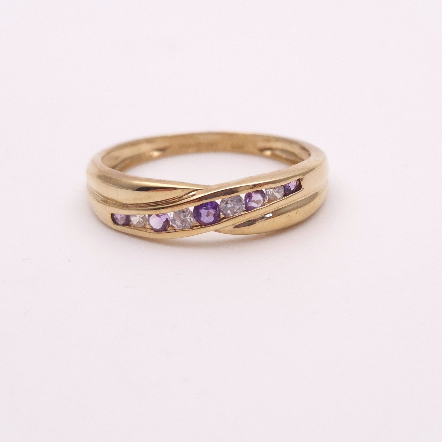 9ct yellow gold amethyst and cubic zirconia channel set wave ring