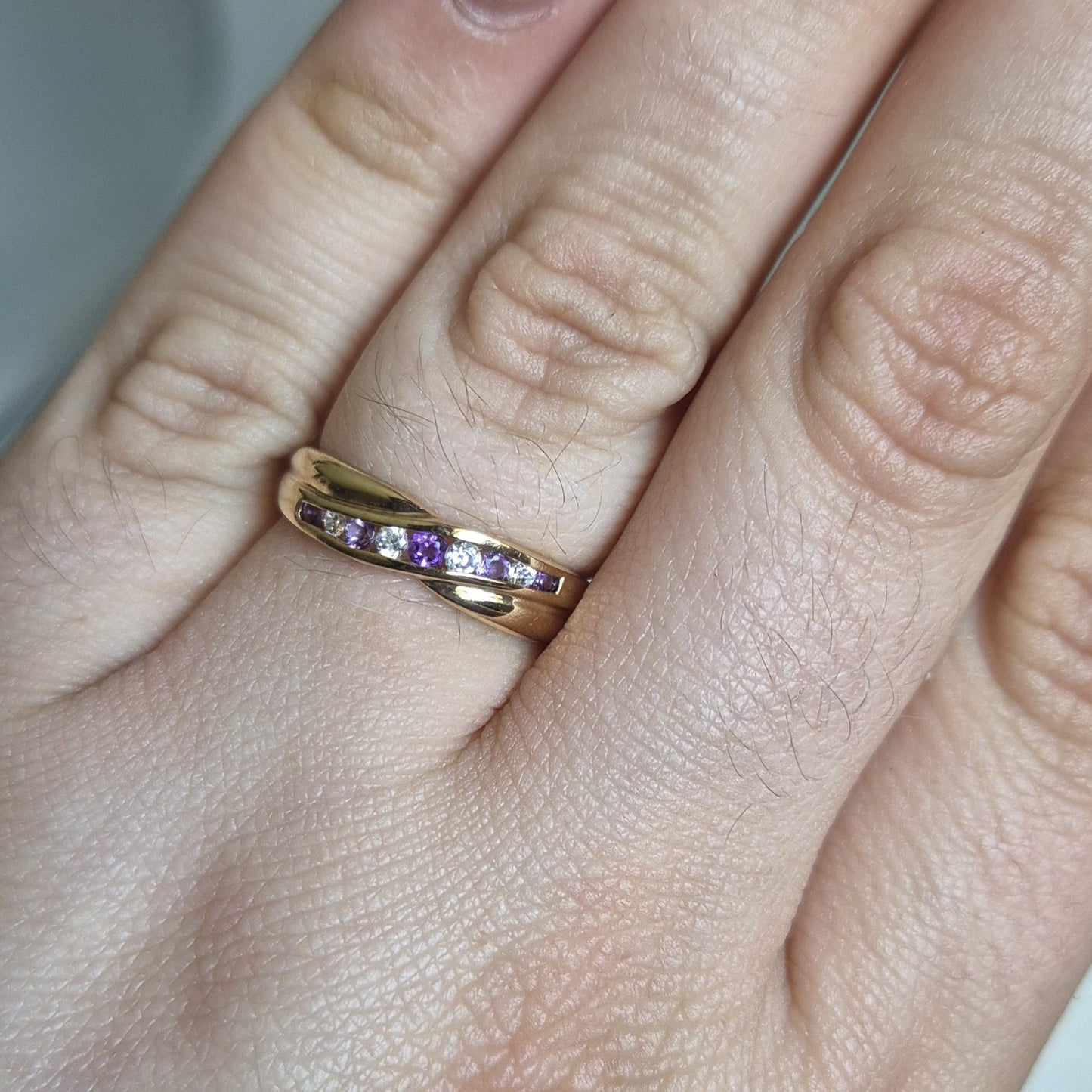 9ct yellow gold amethyst and cubic zirconia channel set wave ring