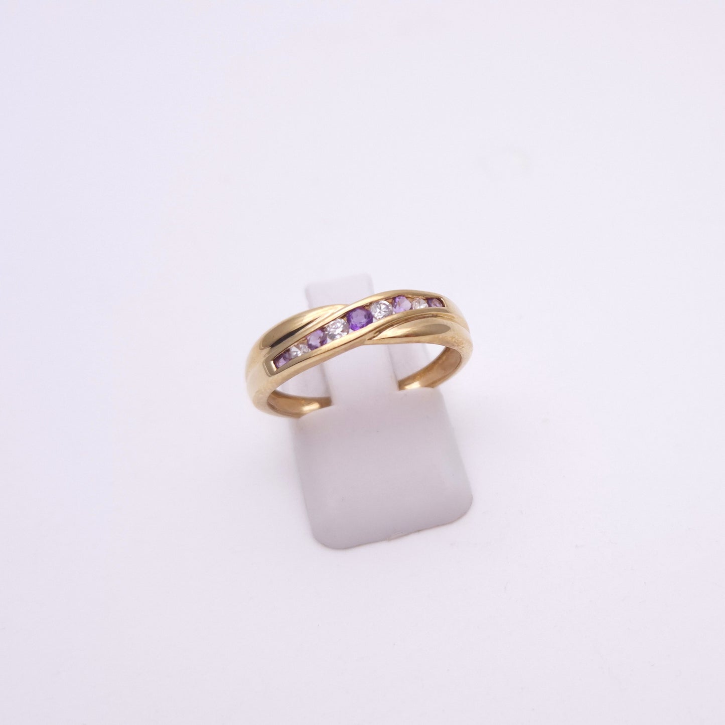 9ct yellow gold amethyst and cubic zirconia channel set wave ring