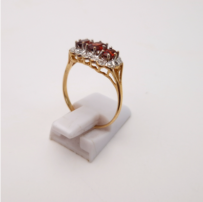 9ct yellow gold traditional 3 stone garnet and diamond ring