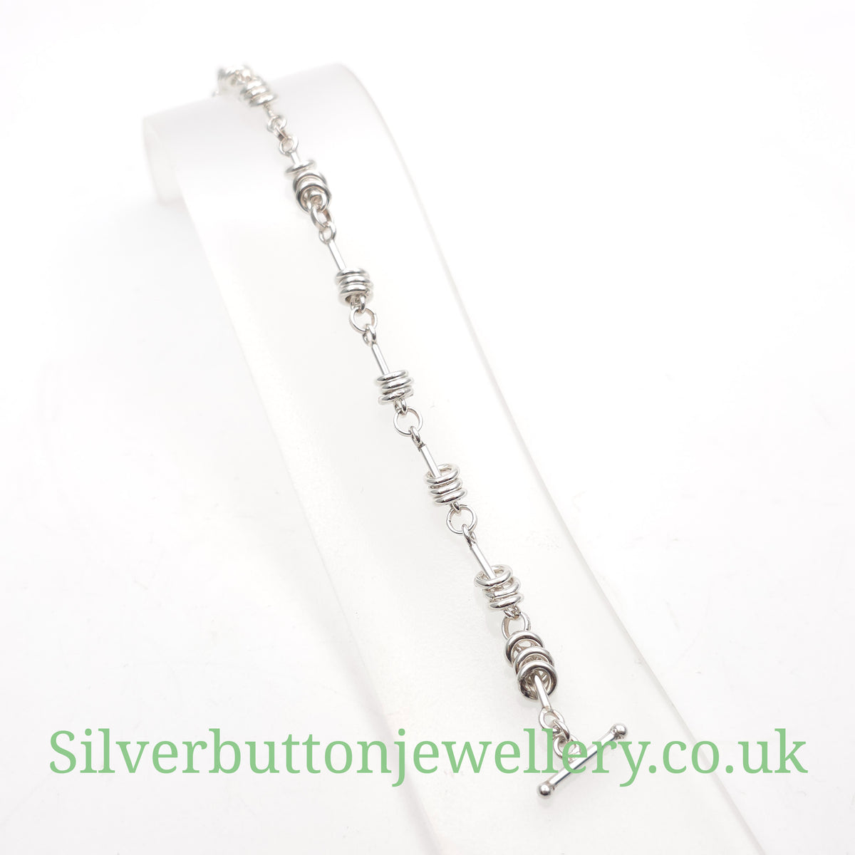Sterling Silver Moving Jump Ring Trio Link T-Bar Closure Bracelet