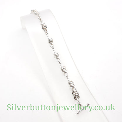 Sterling Silver Moving Jump Ring Trio Link T-Bar Closure Bracelet