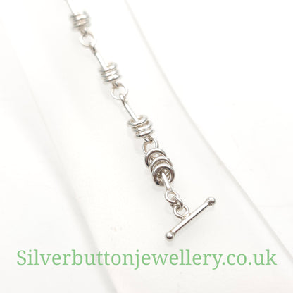 Sterling Silver Moving Jump Ring Trio Link T-Bar Closure Bracelet