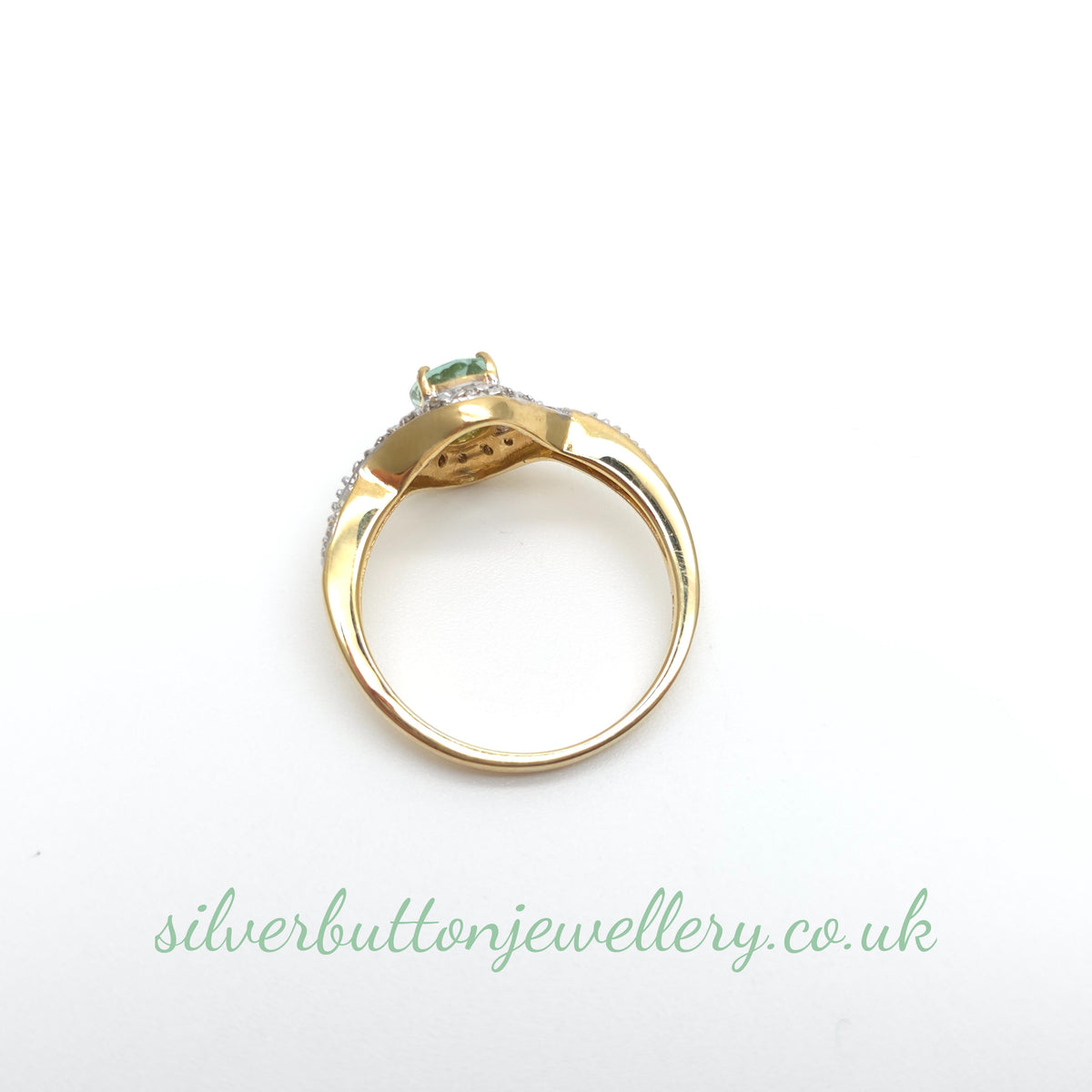18ct Yellow Gold Oval Cut Paraiba Tourmaline And Diamond Open Crossover Ring
