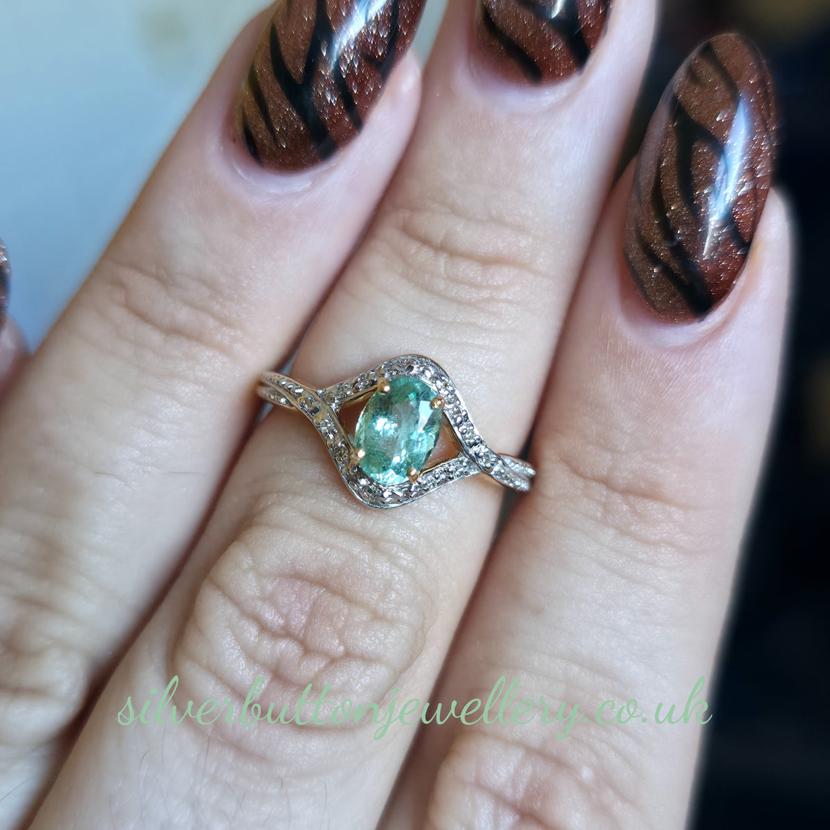 18ct Yellow Gold Oval Cut Paraiba Tourmaline And Diamond Open Crossover Ring