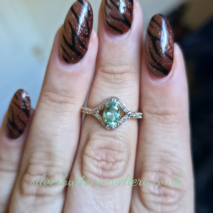 18ct Yellow Gold Oval Cut Paraiba Tourmaline And Diamond Open Crossover Ring