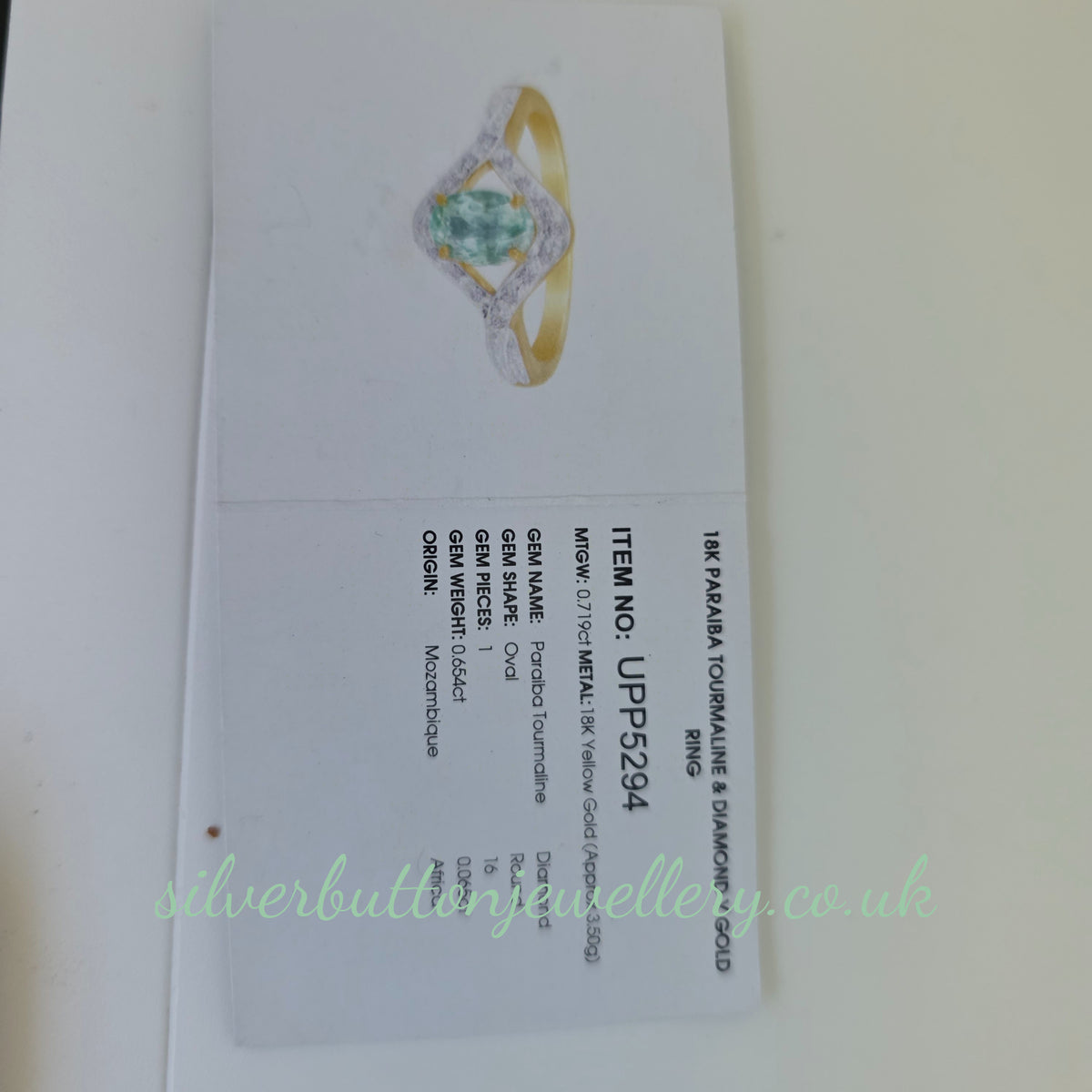 18ct Yellow Gold Oval Cut Paraiba Tourmaline And Diamond Open Crossover Ring