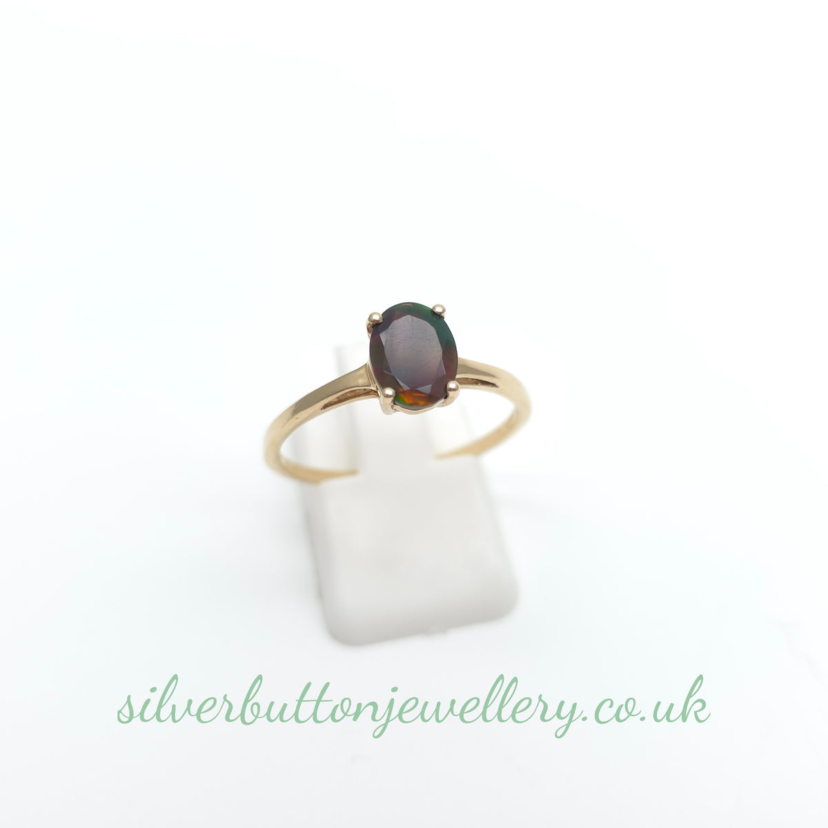 10ct Yellow Gold Faceted Oval Cut Ammolite Solitaire Ring
