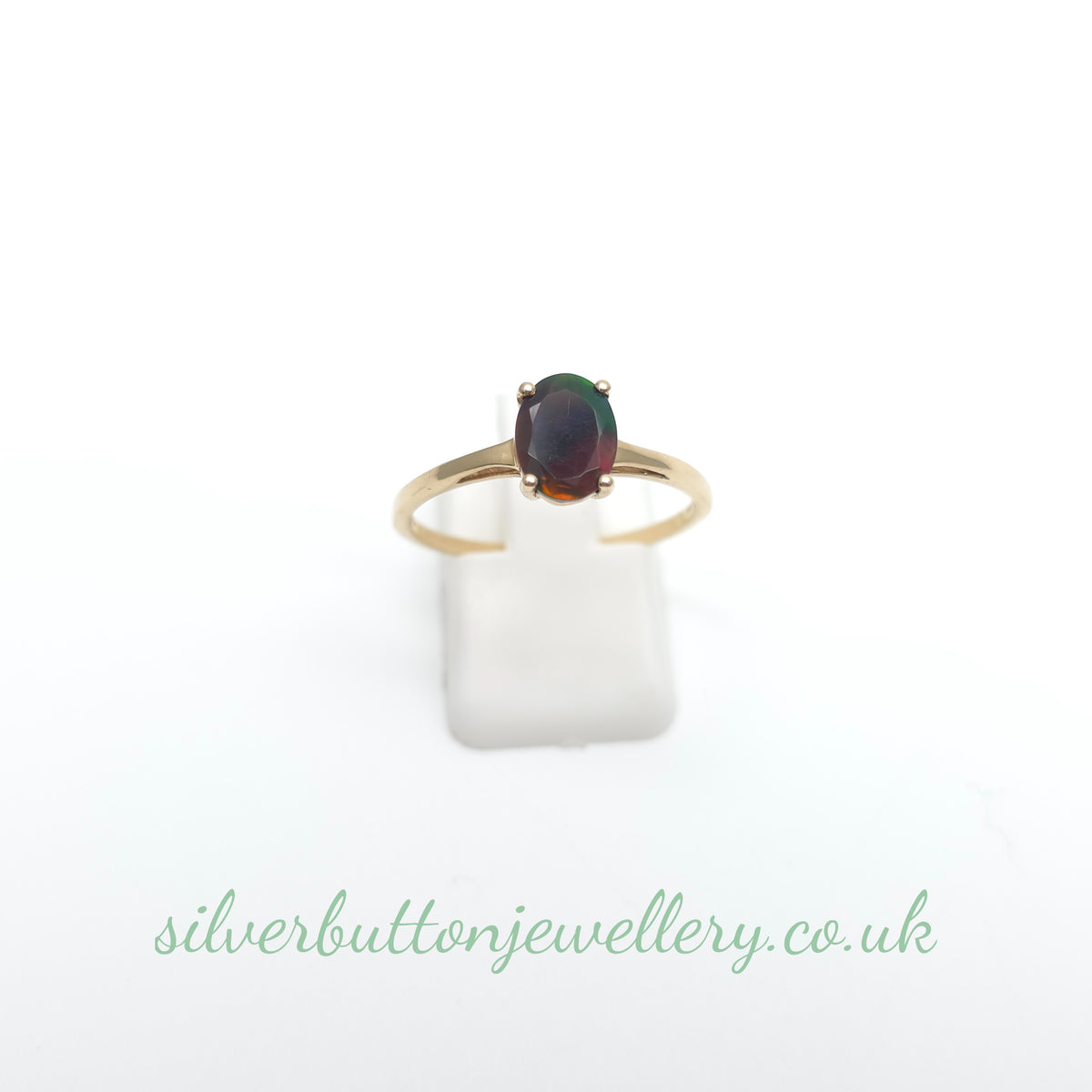 10ct Yellow Gold Faceted Oval Cut Ammolite Solitaire Ring