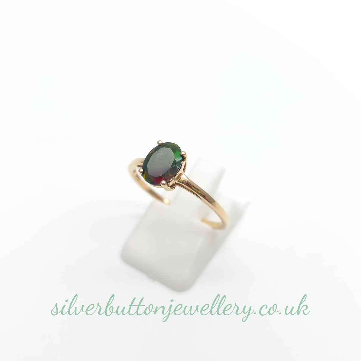 10ct Yellow Gold Faceted Oval Cut Ammolite Solitaire Ring