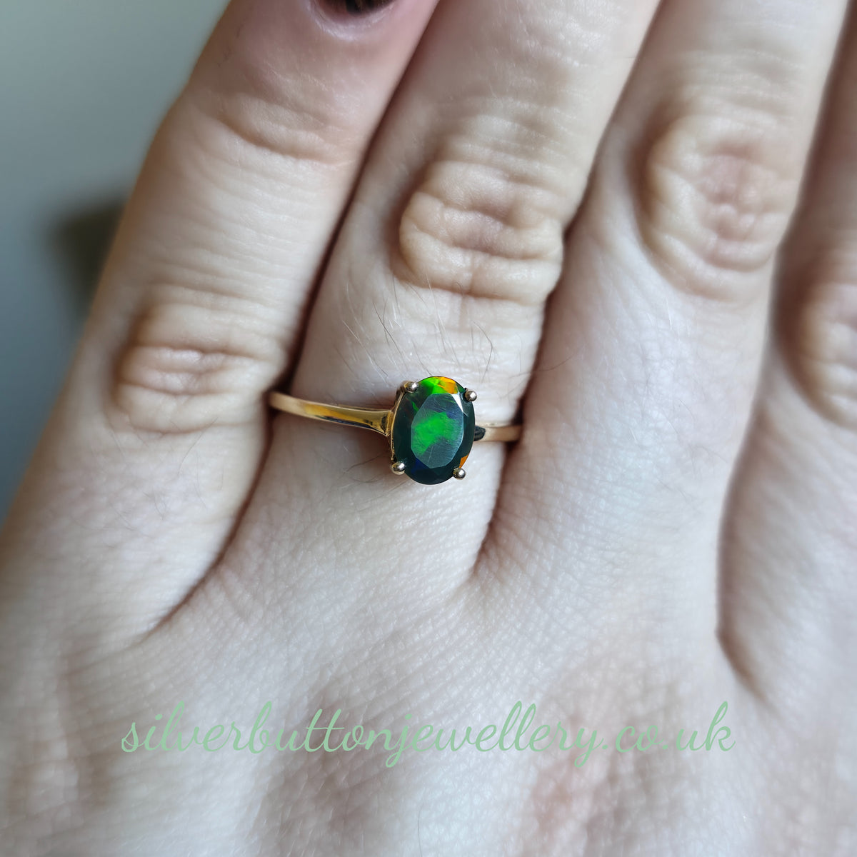 10ct Yellow Gold Faceted Oval Cut Ammolite Solitaire Ring