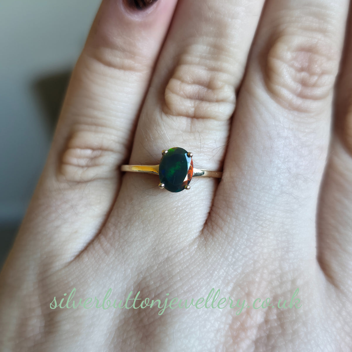 10ct Yellow Gold Faceted Oval Cut Ammolite Solitaire Ring