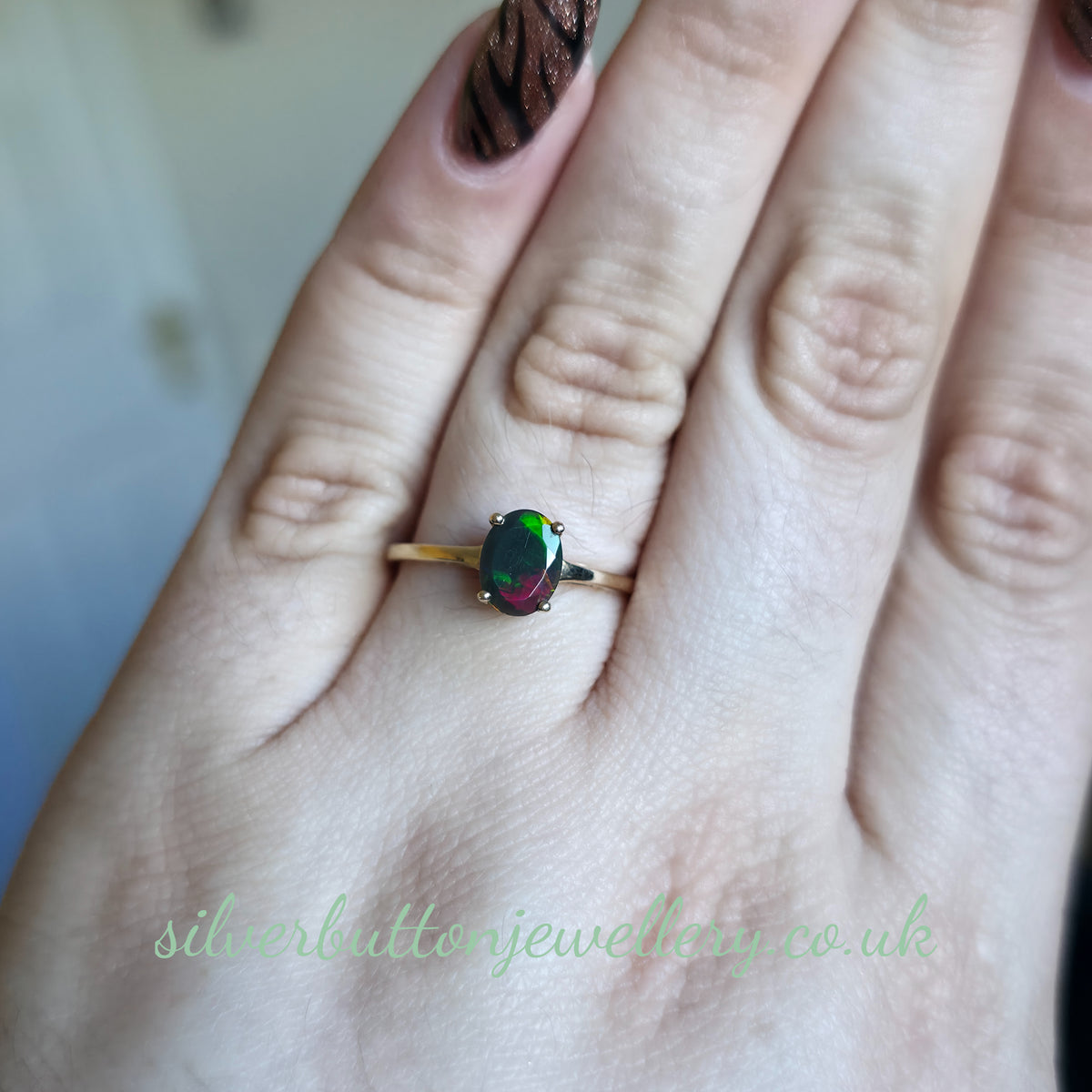 10ct Yellow Gold Faceted Oval Cut Ammolite Solitaire Ring