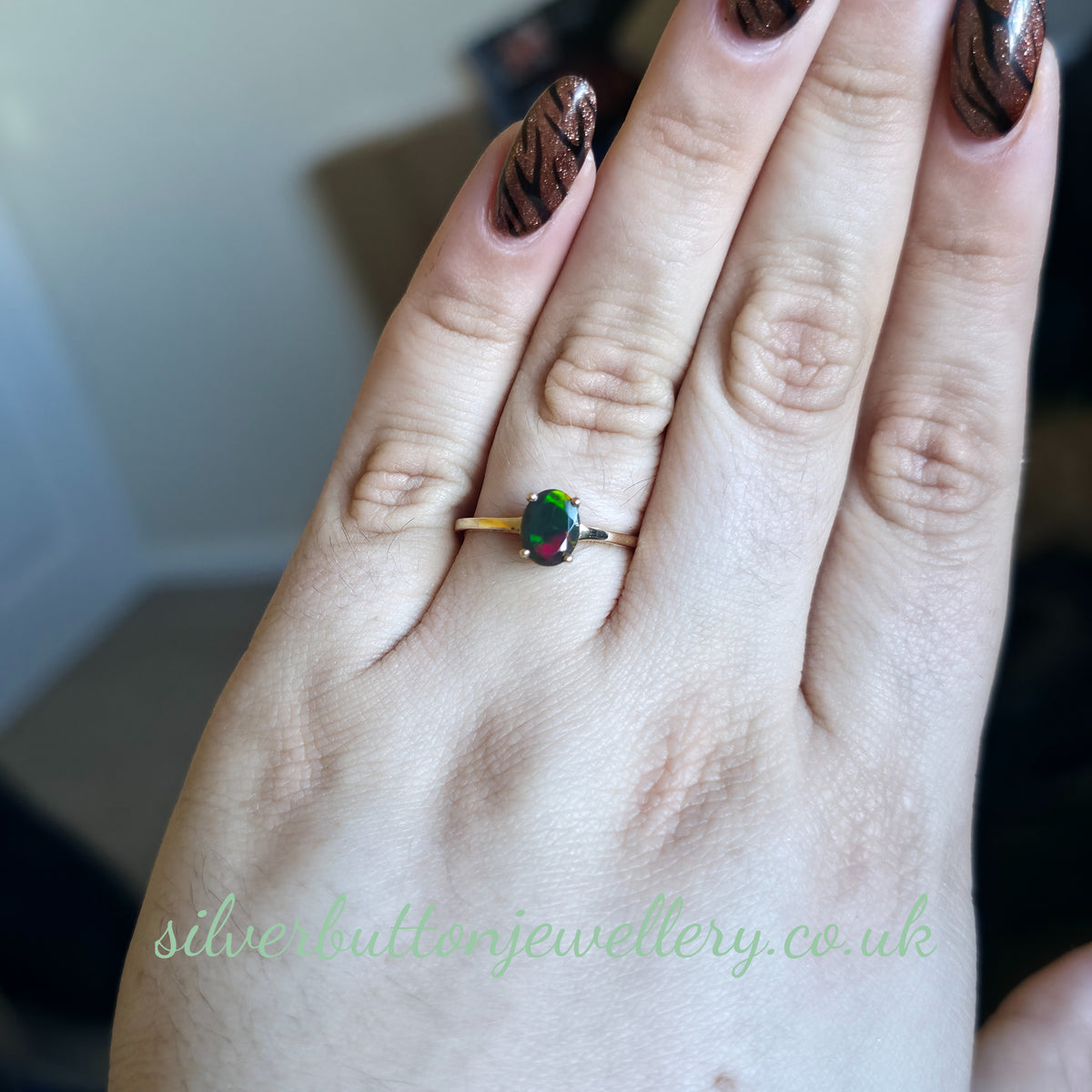 10ct Yellow Gold Faceted Oval Cut Ammolite Solitaire Ring