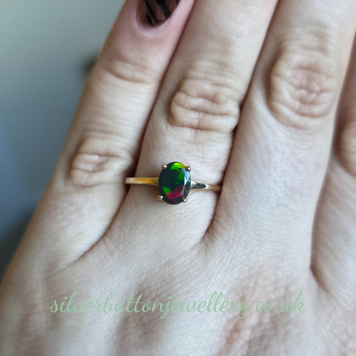 10ct Yellow Gold Faceted Oval Cut Ammolite Solitaire Ring