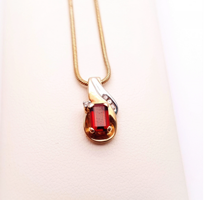 9ct yellow gold garnet and diamond two-tone pendant and chain necklace.