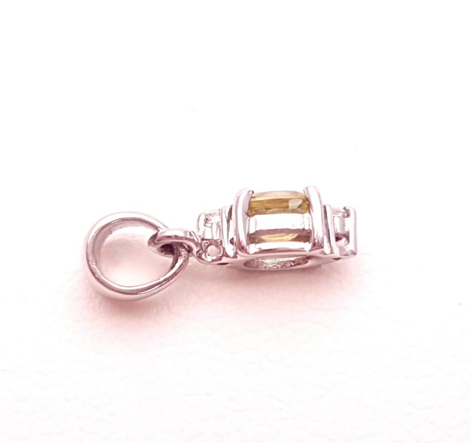 9ct white gold small white cz  and green peridot stone drop pendant